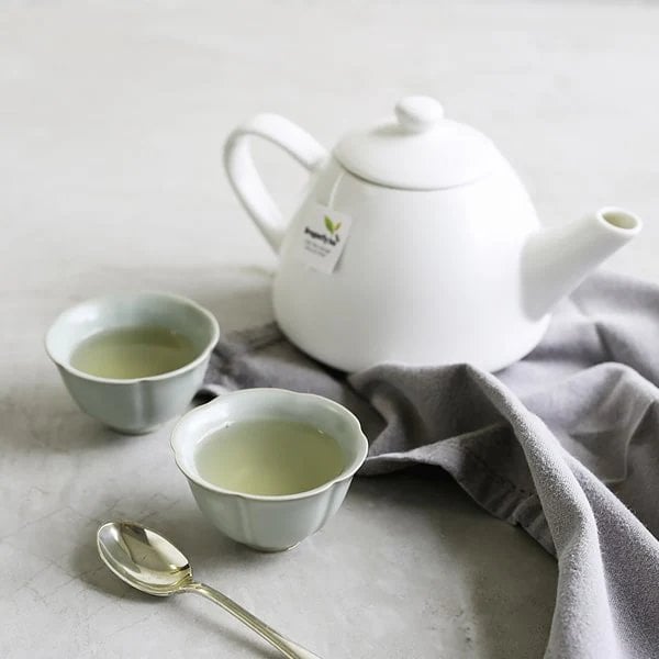 Dragonfly Organic Pure Green Mountain 40 Tea Bags 80G Brewed, Tea In White China Cup, Available At Teas.co.uk