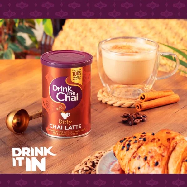 Drink Me Chai Dirty Chai Latte, 200g, jar on table with latte in lifestle, available at teas.co.uk
