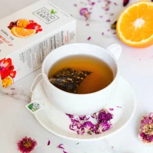 Good Earth Passionfruit and Orange, 15 Tea Bags 37.5g, brewing tea in white cup, available at teas.co.uk
