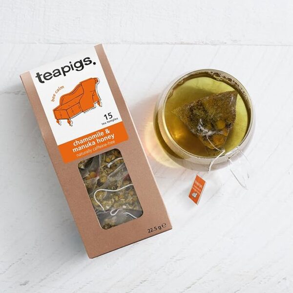 Teapigs Chamomile and Manuka Honey, 15 Tea Bags 22.5g, front of box with tea brewing in clear glass cup, available at teas.co.uk