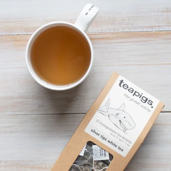 Teapigs Silver Tips White Tea, 15 Tea Bags 37.5g, lifestyle showing box of tea and mug of hot tea, available at teas.co.uk