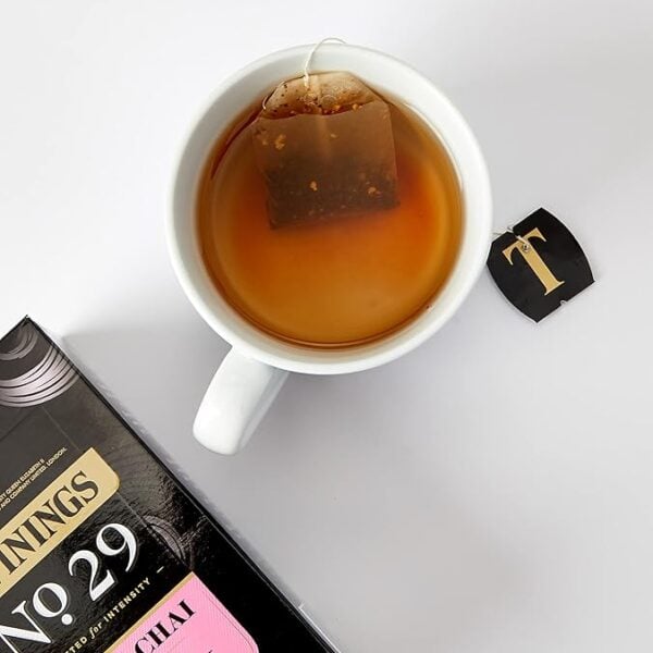 Twinings Dark Chai, 40 Tea Bags 80G, Top View Of Tea Brewing In Mug With Partial Of Box, Available At Teas.co.uk