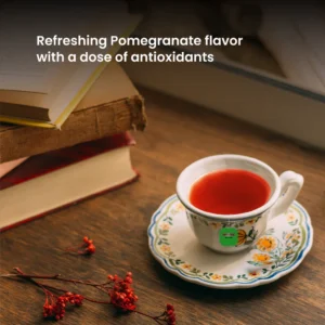 Twinings Pomegranate Green Tea, 20 Tea Bags 40g, brewed tea in cup and saucer, available at teas.co.uk
