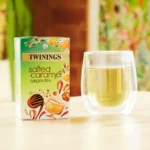 Twinings Salted Caramel Green Tea, 20 Tea Bags 40g, lifestyle showing box of tea and brewing cup of tea, available at teas.co.uk