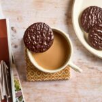 Border Dark Chocolate Ginger Organic Biscuits, 150g, biscuit resting on mug of tea, available at teas.co.uk