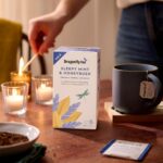 Dragonfly Organic Sleepy Mint and Honeybush, 20 Tea Bags 34g, box on table with mug brewing, available at teas.co.uk