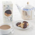 Island Bakery Chocolate and Ginger Organic Biscuits, 133g, lifestyle action shotwebp, available at teas.co.uk
