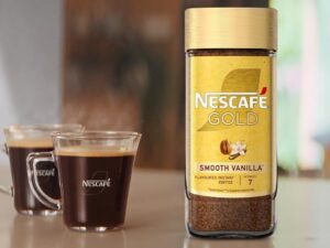 Nescafé Gold Blend Alta Rica Coffee, 95g, front of jar and two cups of coffee, available at teas.co.uk