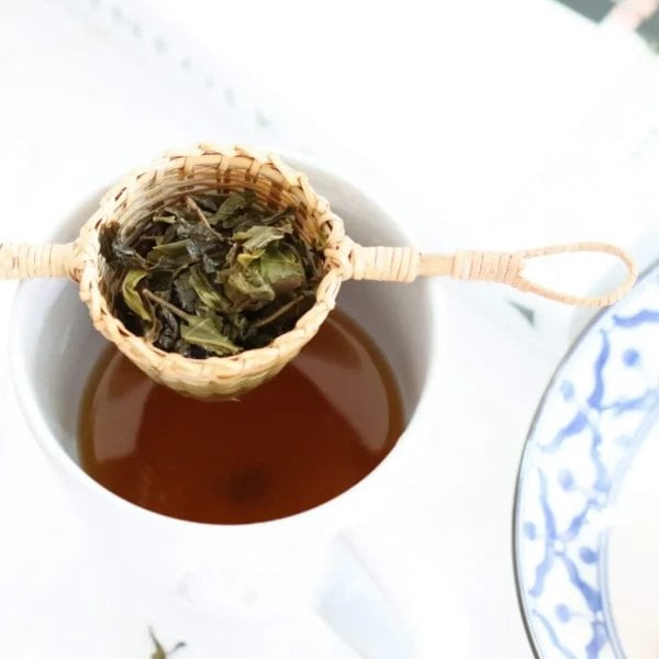 Pattiya Bamboo Tea Strainer Handmade In Thailand Top View, Brewing In Mug, Available At Teas.co.uk