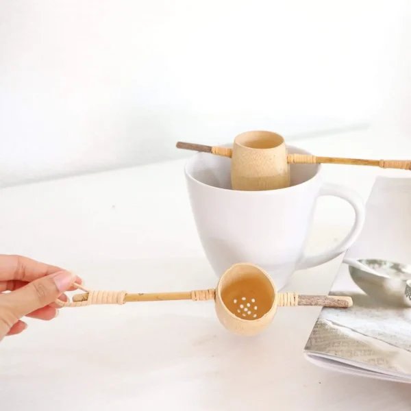 Tunta Bamboo Tea Strainer Handmade In Thailand Top View, in hand, available at teas.co.uk
