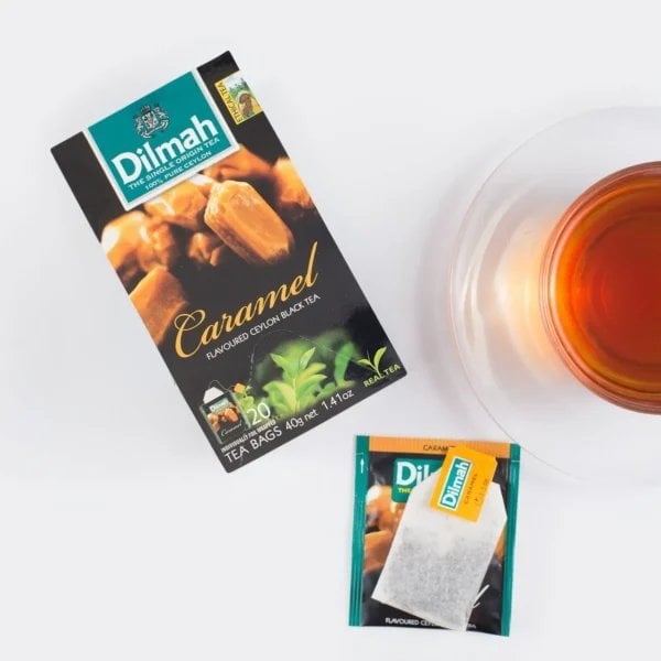 Dilmah Caramel Tea, 20 Tea Bags 30G, Lifestyle Showing Tea Brewing0With Tea Box, Available At Teas.co.uk