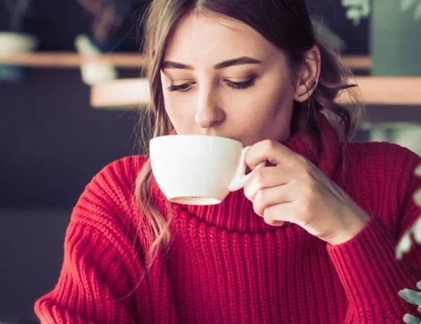 Twinings Orange And Cinnamon (International Blend), 25 Tea Bags 50G, Lifestyle Lady Drinking Tea, Available At Teas.co.uk