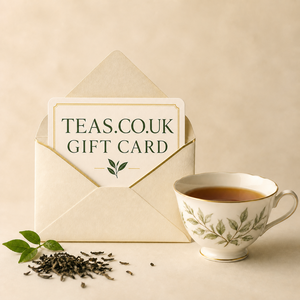 Branded Teas.co.uk Gift Card in a cream envelope beside a cup of tea