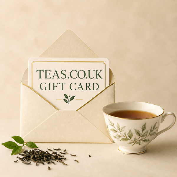 Branded Teas.co.uk Gift Card in a cream envelope beside a cup of tea