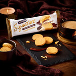 McVitie's Signature Cocoa Truffle Gold Rounds Biscuits, 109g, pack shot 2, available at teas.co.uk